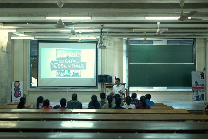 Sukhith leading a workshop in a lecture hall